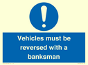 vehicles-must-be-reversed-with-a-banksman~